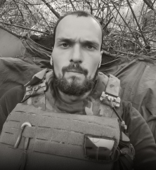 Олег Белый